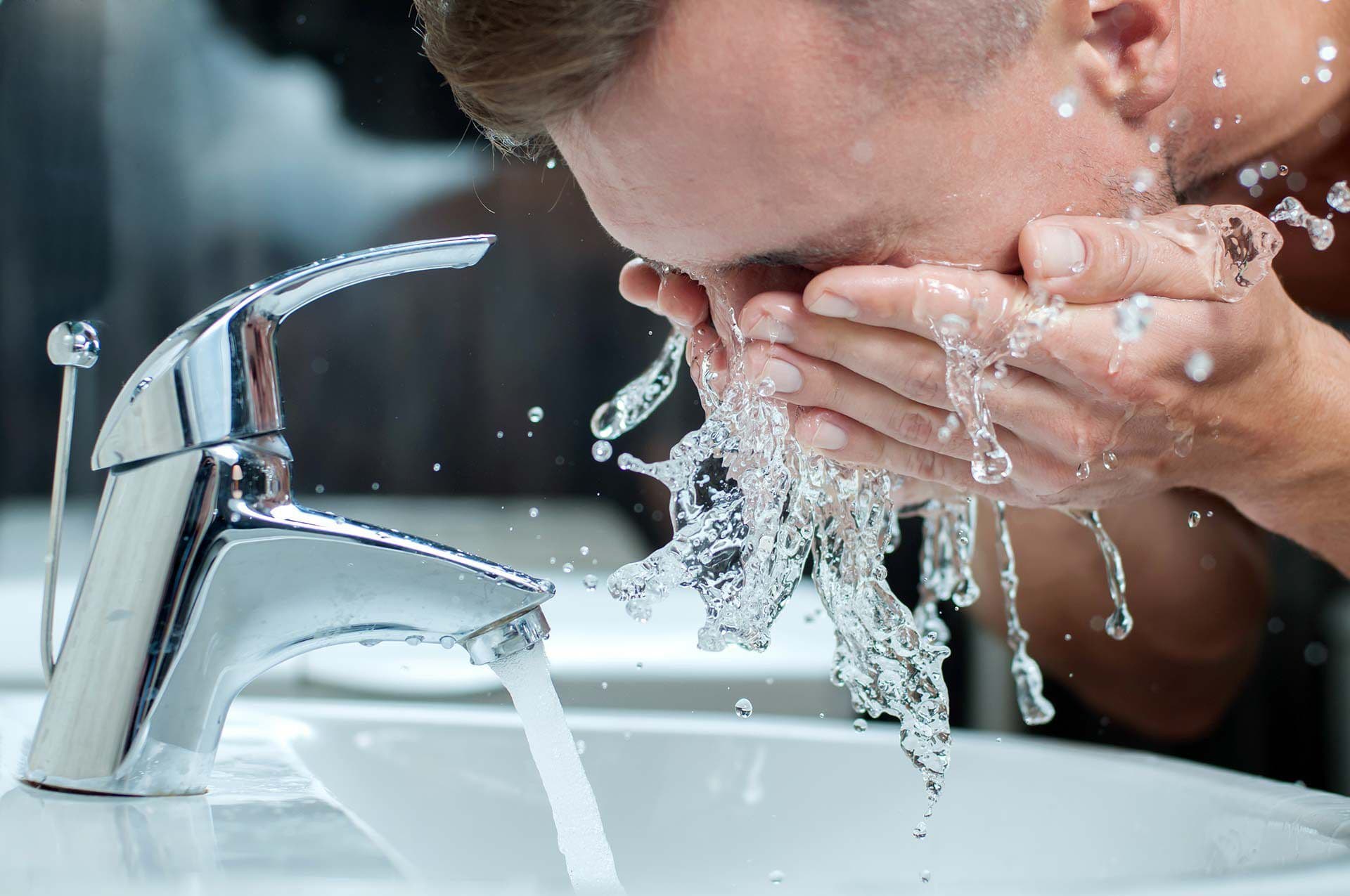 Man washing face